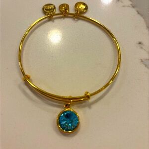 Alex & Ani Gold Bracelet with Blue Charm